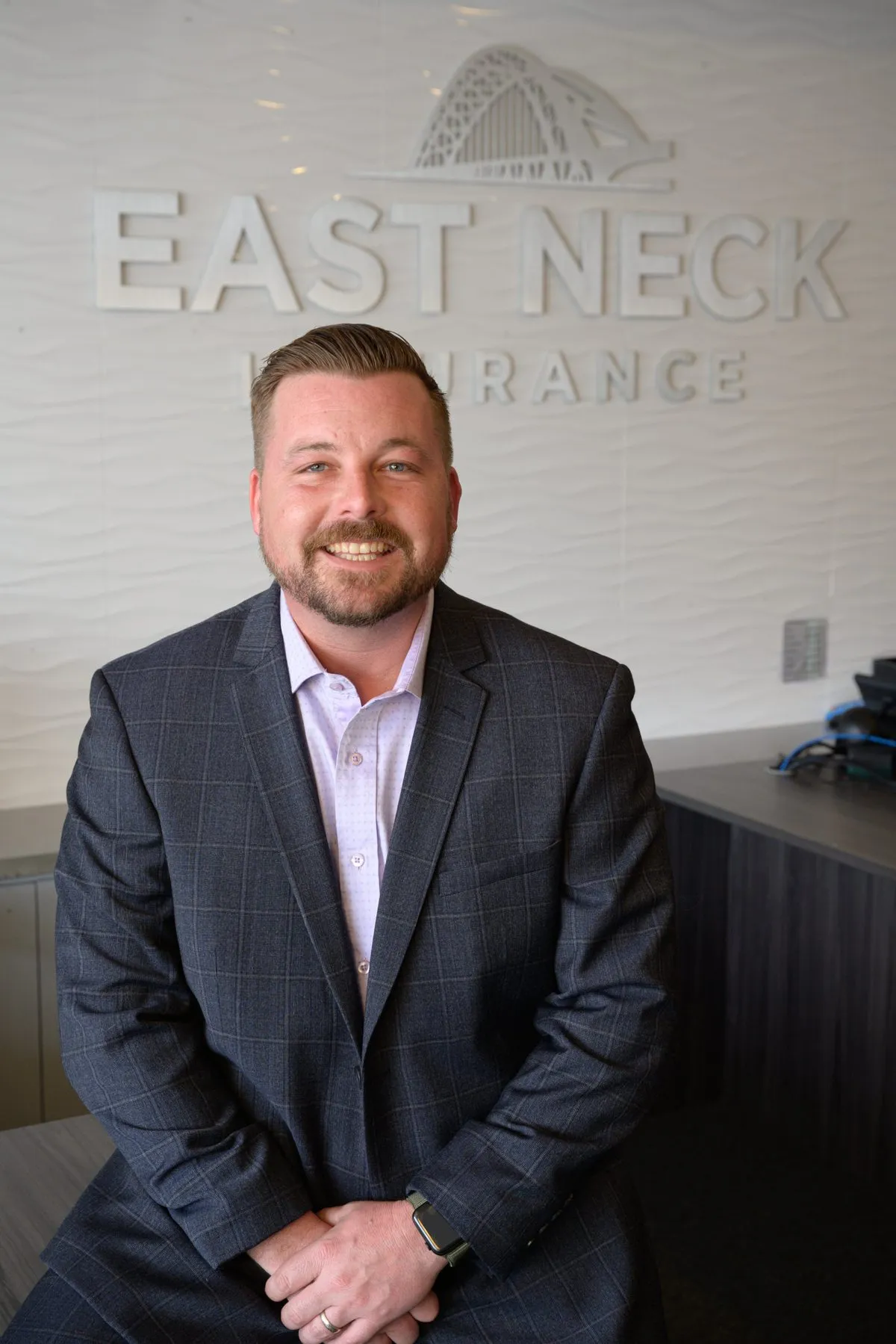 Daniel Walsh, owner of East Neck Insurance, in the West Babylon office
